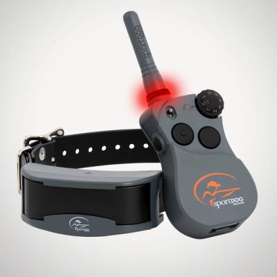 dog training system with a flashing LED on the antenna of the remote